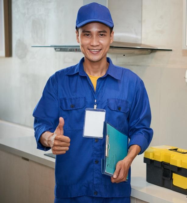 Helpful service man for water cooler repair