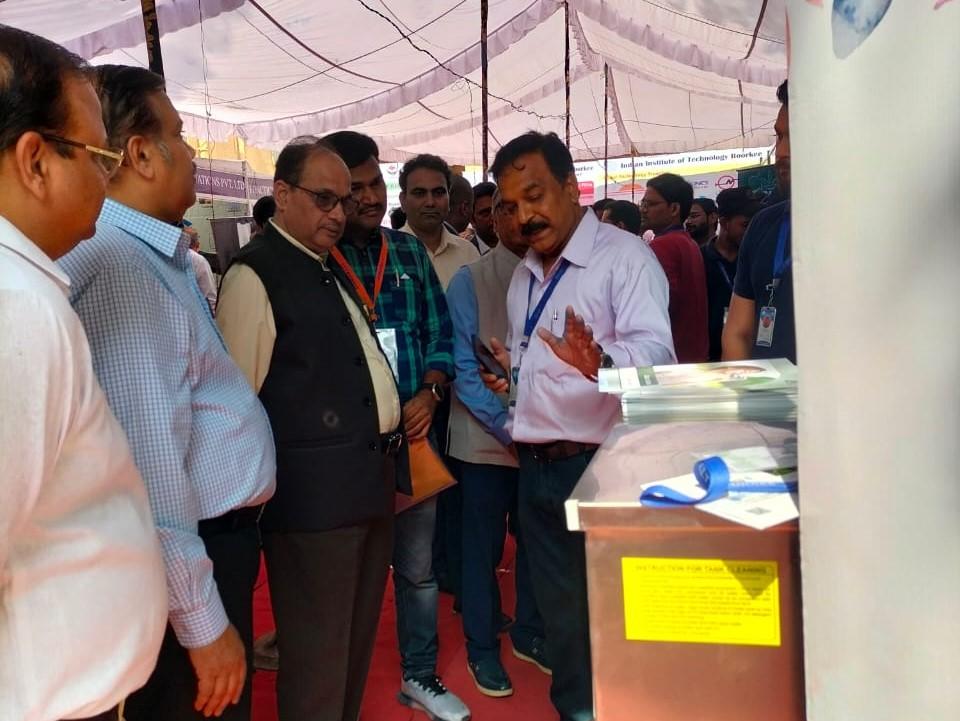 Ballice showcasing the water cooler to the chief guest